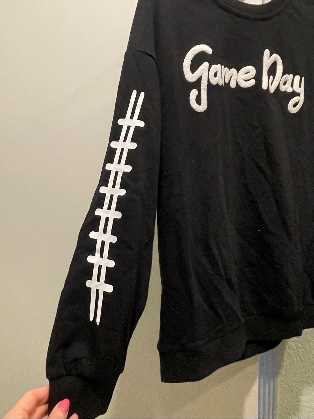 Game Day Black Pullover Sweatshirt with White Football Stitch Sleeve